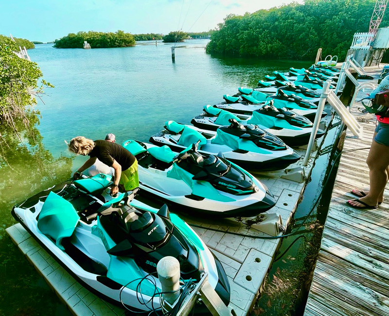 Several jet skis at the dock ready for a jet ski tour in Key West